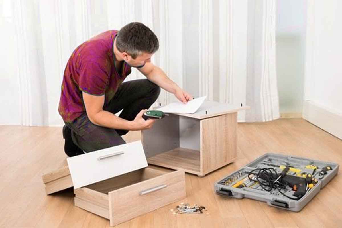 Man assembling furniture